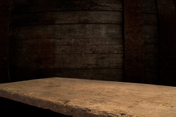 background barrel and worn old table of wood