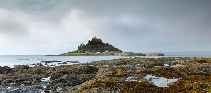 View across rocky foreshore towards St Michaels Mount, Marazion, Cornwall