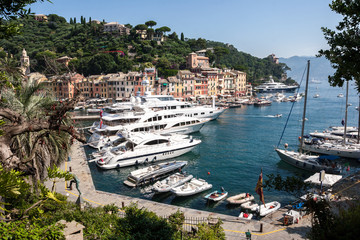 Fototapeta na wymiar Luxury boats moored in Portofino in Italy