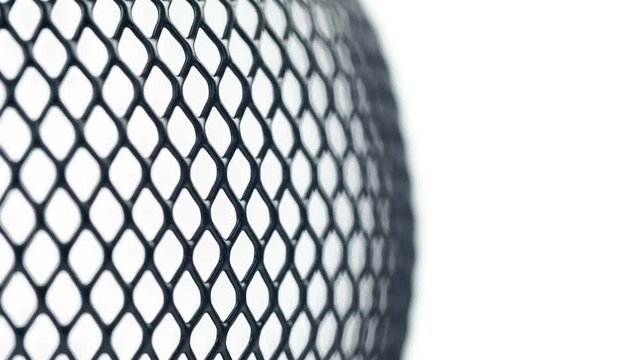 Black grid rotating on white background. Close up macro 4k footage.