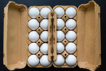Organic white chicken eggs for food in carton box