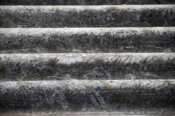 Old gray wavy slate. Texture of asbestos-cement slate with place for text. Slate background for design.