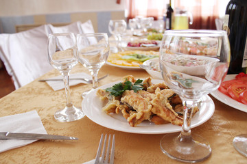 Festive table in the Russian restaurant. Kitchen and serving.