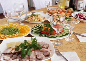 Festive table in the Russian restaurant. Kitchen and serving.