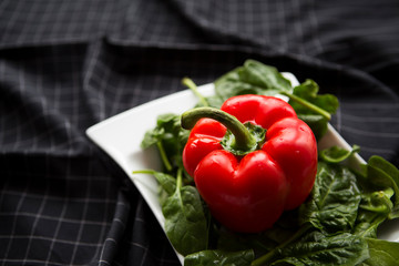 Sweet red pepper, spinach salad. Diet concept. Healthy eating 