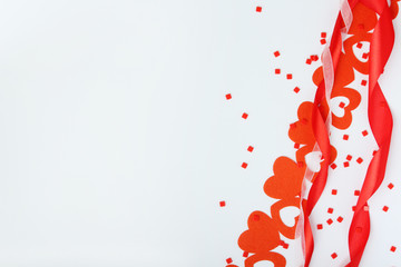 Background wit red ribbon and bright hearts for Valentine day decoration
