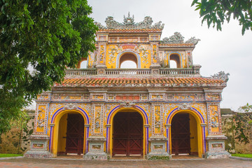 Fototapeta premium A gate in the Dien Tho Residence in the Imperial City, Hue, Vietnam