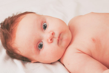 Portrait of the lovely girl of the baby.