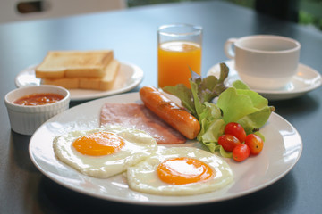 breakfast with fried eggs and bacon
