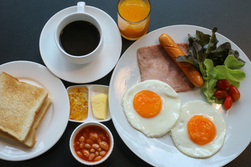 breakfast with fried eggs and coffee