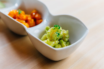Popcorn Shrimp mix with thousand island sauce and wasabi sauce served with lettuce in mayo.
