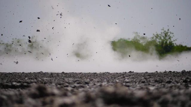 mud volcano with bursting bubble bledug kuwu. volcanic plateau with geothermal activity and geysers, slow motion Indonesia java. aerial view volcanic landscape