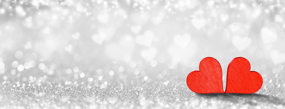 Red hearts on bokeh background