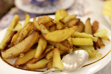 Slices of fried potatoes