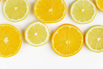 Fototapeta premium citrus slice, oranges and lemons on white background