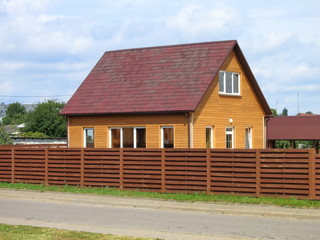 Fototapeta na wymiar The brown house in the village