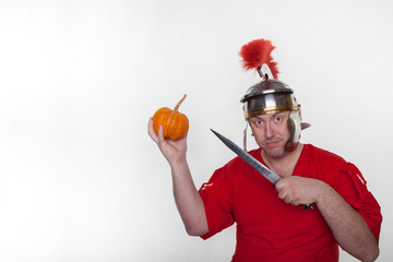 A roman soldier with a pumpkin and dagger