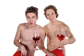 Two funny naked guys holding glasses with red wine and heart isolated on white background