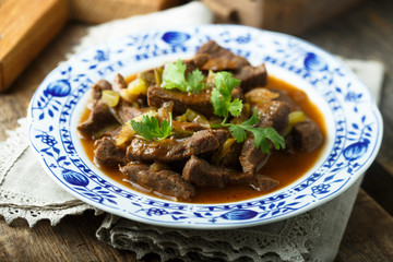 Beef goulash with pickled cucumber