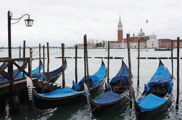 Naklejka na ściany i meble Gondolas in Venice Italy Adriatic sea. Markusdom. St Mark's Basilica Square. Saint Marco Square.