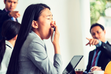 Business woman getting bored while attending the seminar in office ,business, teamwork, people and crisis concept