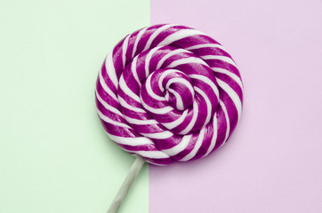 beautiful purple lollipop on a background