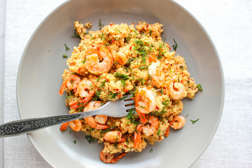 Grits cous cous with vegetables and grilled shrimp