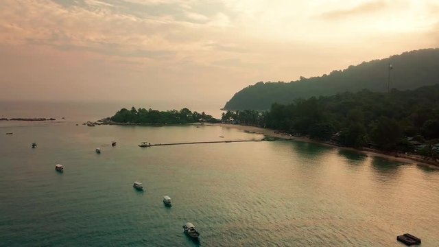 Sunrise aerial view of boats and crystal clear waters at Perhentian Islands (Pulau Perhentian)