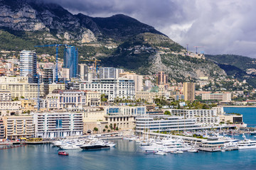 Fototapeta na wymiar Cityscape and harbor of Monte Carlo. Aerial view of Monaco on a Sunny day, Monte Carlo, Principality of Monaco 