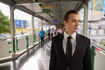 Young businessman exploring the city of Bangkok, Thailand