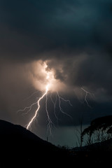 Lightning and thunder in a thunderstorm on a summer night