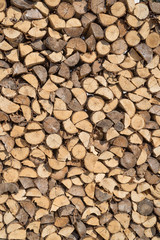 Sorted wood log background texture. Stack of arranged brown wood log background