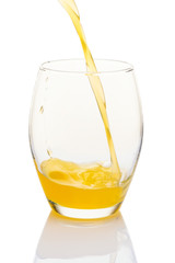 Single glass of orange juice on white background