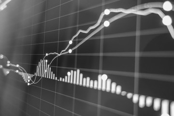 Stock exchange market in black and white on LED screen. Finance and economic concept.