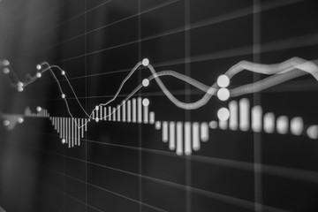 Stock exchange market in black and white on LED screen. Finance and economic concept.