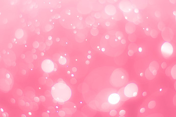 abstract bokeh light effect with soft pink background