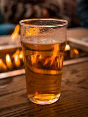 Pint of Beer beside a Fire Pit