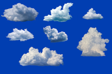 Naklejka na ściany i meble natural background, some cumulus clouds isolated on a dark blue