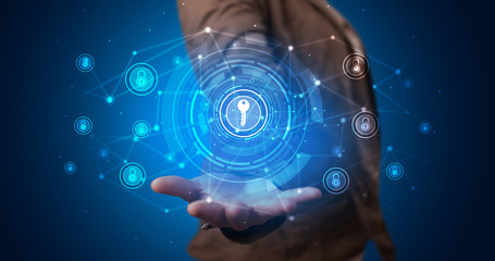 Young person holding hologram screen displaying security infomartions
