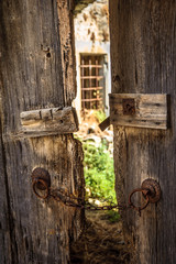 View of the window through the door ajar