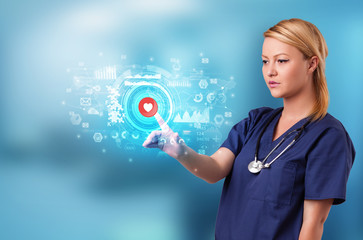 Doctor touching hologram screen displaying medical symbols and charts
