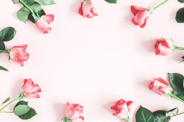 Flowers composition. Pink rose flowers on pastel pink background. Valentines day, mothers day, womens day concept. Flat lay, top view, copy space