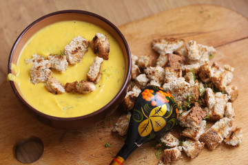 pumpkin soup puree with mushed pumpkin and toast, crouton garlik and dill