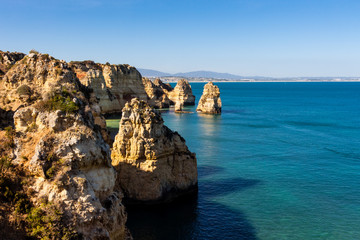 Beautiful panoramic sea view over rocks and cliffs in the Atlantic Ocean at Ponta da Piedade, Algarve region, Portugal