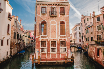 Fototapeta na wymiar Beautiful tenement house and Grand Canal in Venice, Italy