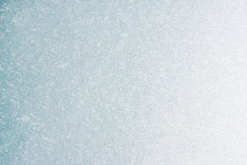 Frozen winter abstract background on the window glass with copy space