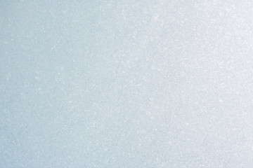 Frozen winter abstract background on the window glass with copy space