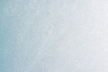 Frozen winter abstract background on the window glass with copy space