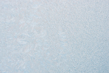 Winter background with gleaming ice. Frozen water texture. Copy space