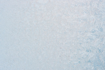 Winter background with gleaming ice. Frozen water texture. Copy space
